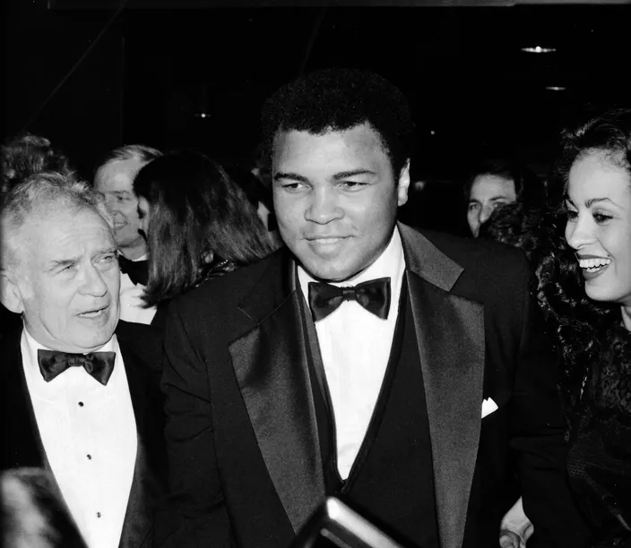 Norman Mailer with Muhammad Ali and Lonnie Ali, 1986